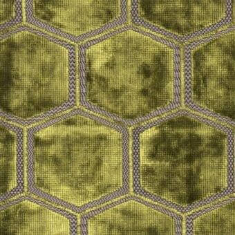 Moss green textile sample with repeating hexagonal pattern, zigzag borders in muted yellow and dark gray, woven texture.